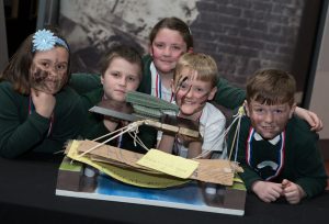 Local primary schools participating in the Rochester Bridge Trust Bridge Building Day at the Royal Engineers Museum, Gillingham. Children from Warren Wood Primary Academy who finished 1st with their winning bridge, prizes and trophy. Royal Engineers Museum, Prince Arthur Road, Gillingham, Kent. ME4 4UG.